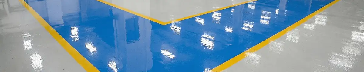 A factory floor professionally covered and marked with epoxy flooring in Cincinnati, OH