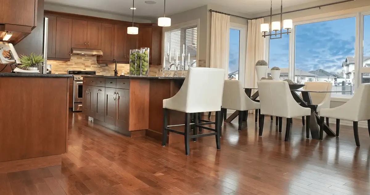 A modern kitchen with professionally installed wood flooring in Cincinnati, OH