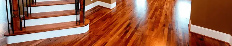 Base floor of a staircase with professionally restored wood flooring in Cincinnati OH