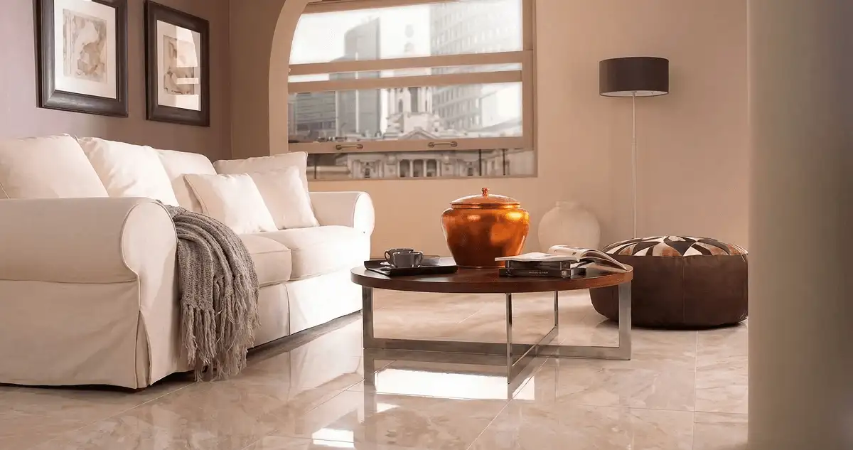 Modern living room with professionally installed marble flooring, a beige sofa, coffee table in Cincinnati, OH