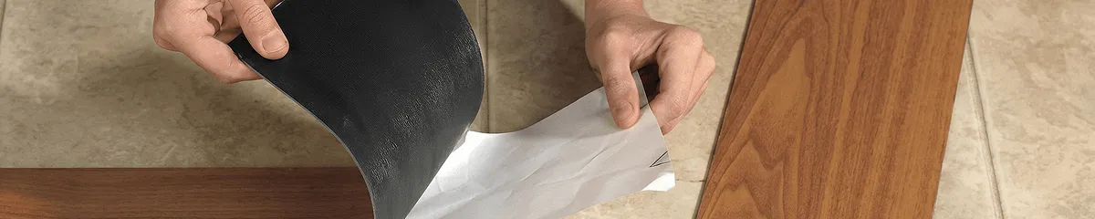 A professional installing vinyl flooring in Cincinnati, OH