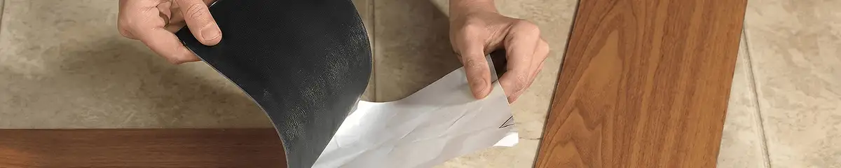 A professional installing vinyl flooring in Cincinnati, OH